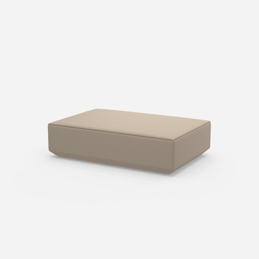 Cream-colored pouf from the side