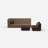 Three-seater sofa with armchair and high backrest from the front
