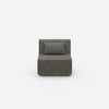 Modern armchair without backrest from the front