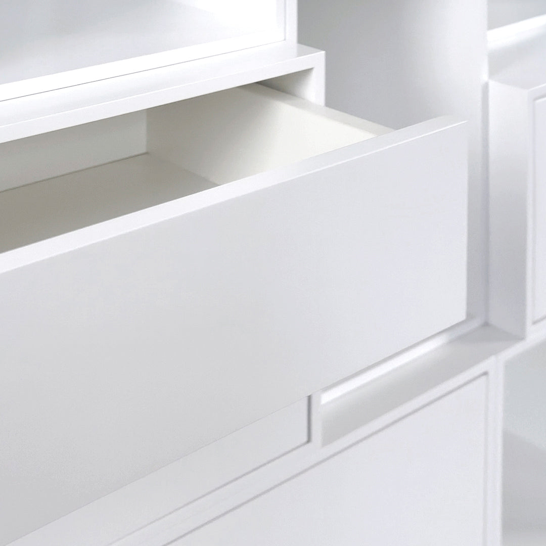Open drawer of a Cubit shelving system with minimalist, handleless front design





