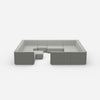 Îlot de canapé confortable dans des tons gris vu de face